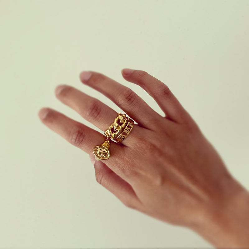 Gold portrait ring with stacking rings