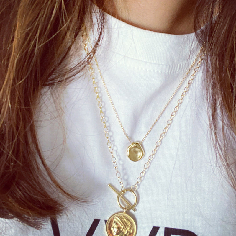 gold hammered coin necklace and roman empress necklace  lifestyle